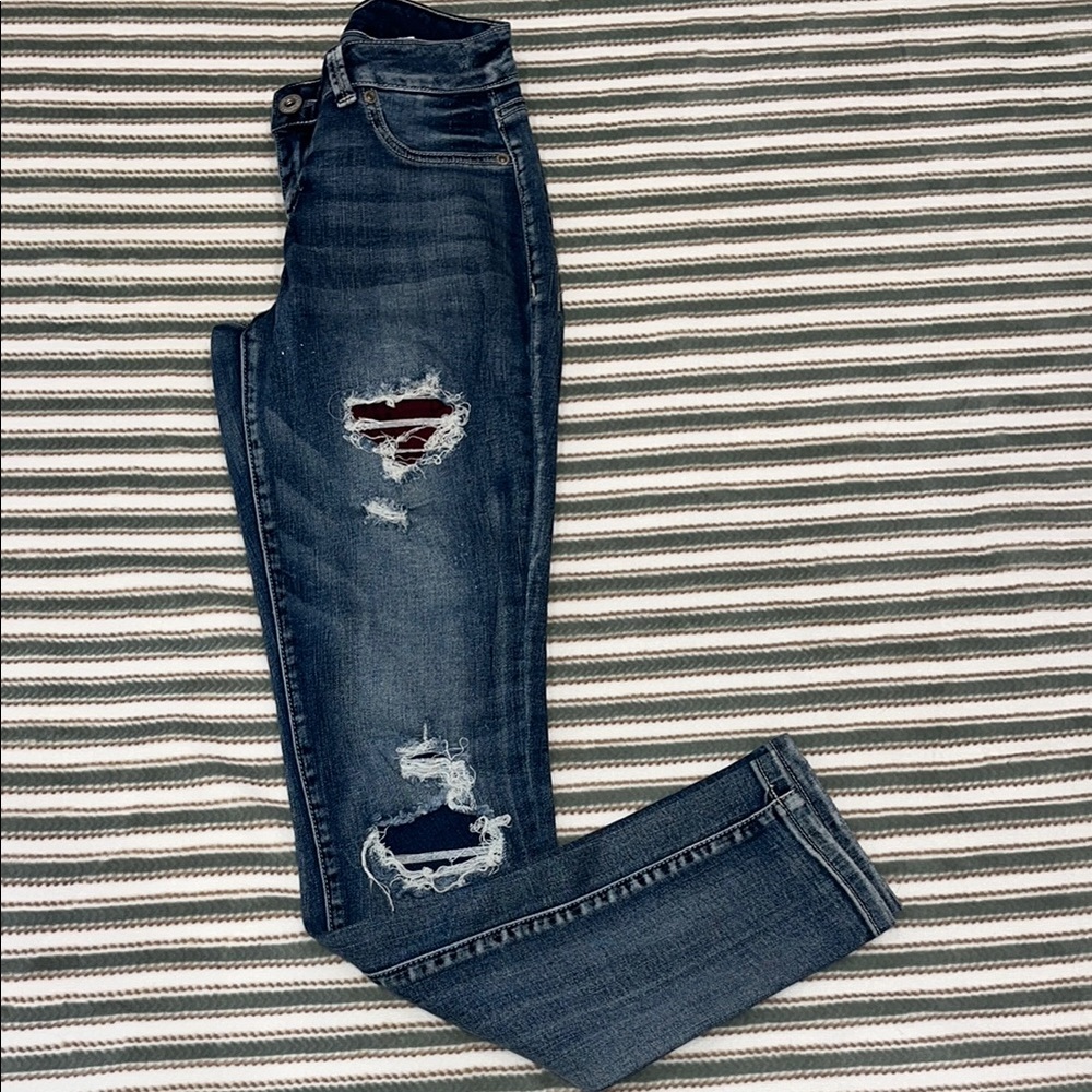 MAURICES Women’s distressed jeans. Front rip holes have material sewed in
